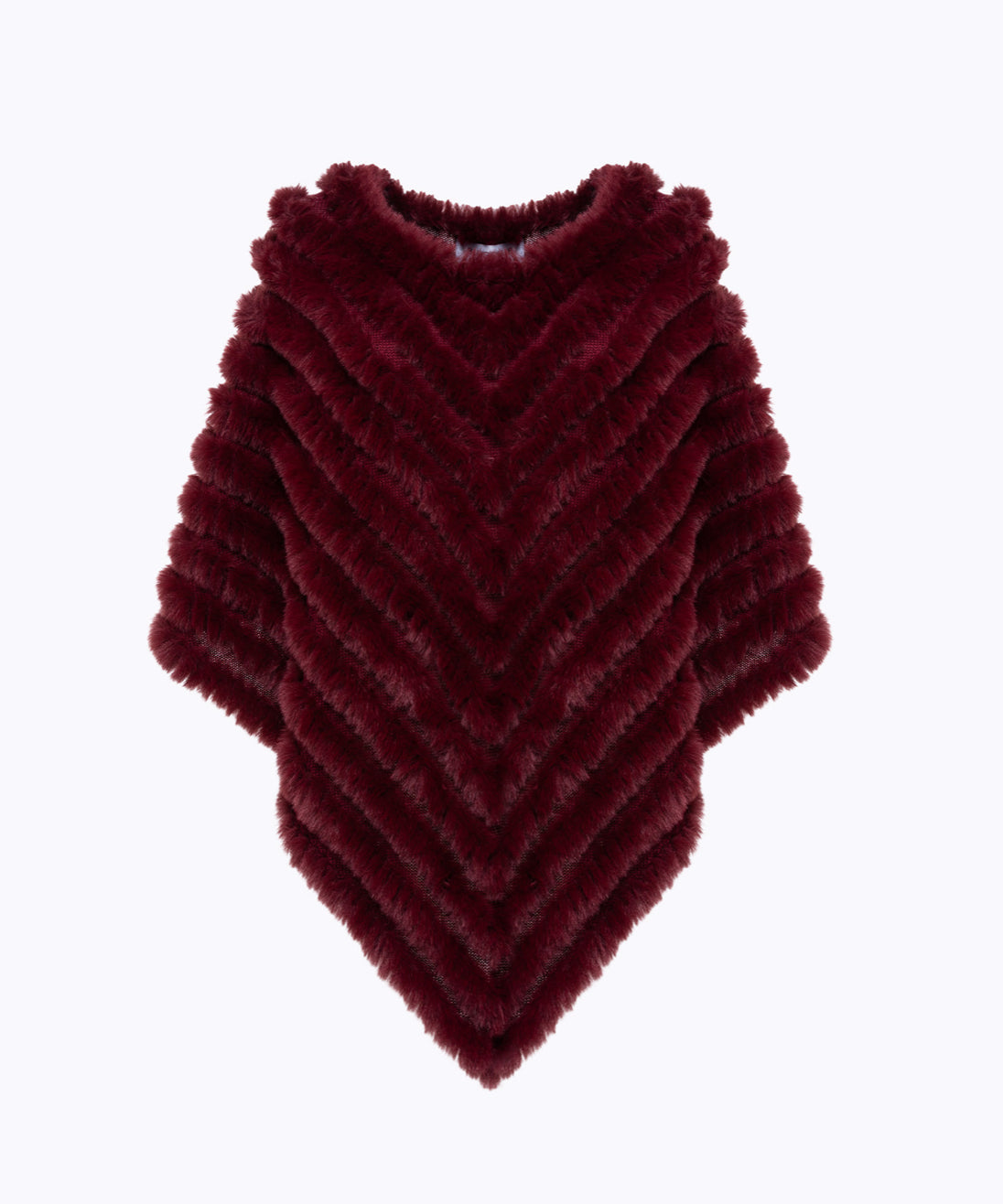 Poncho in faux fur con spilla