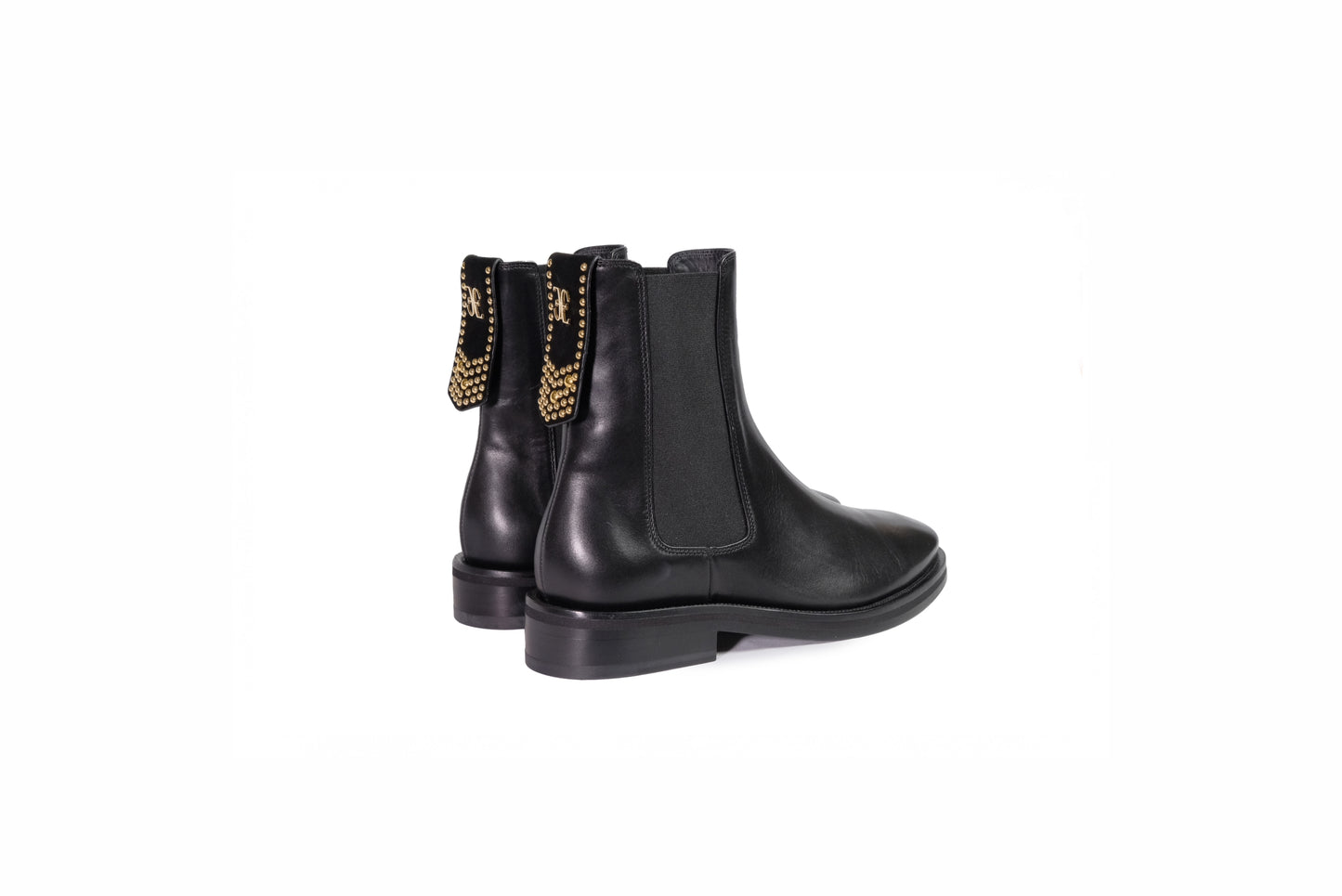 Stivaletto basso in pelle nera con elastico sui lati e dettagli dorati sul retro “Fabi”
