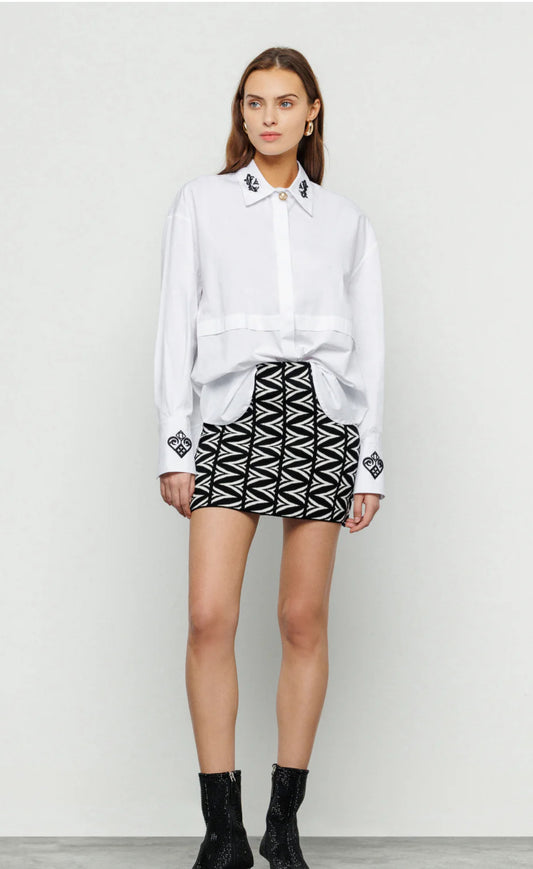 Minigonna jacquard allover logo “Akep”