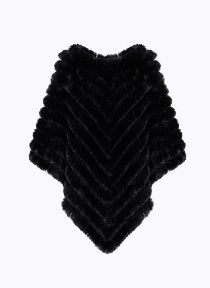 Poncho in faux fur con spilla