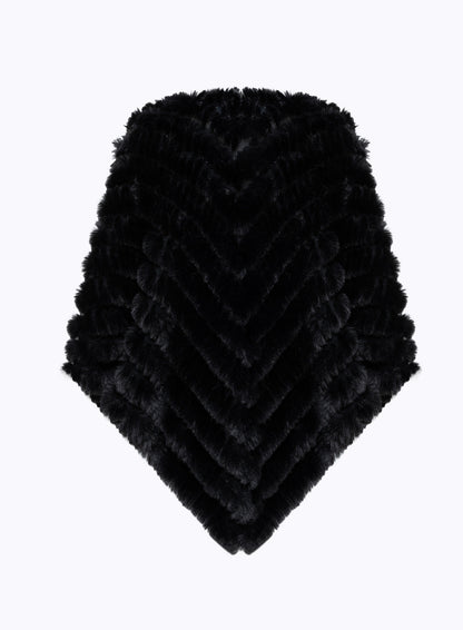 Poncho in faux fur con spilla