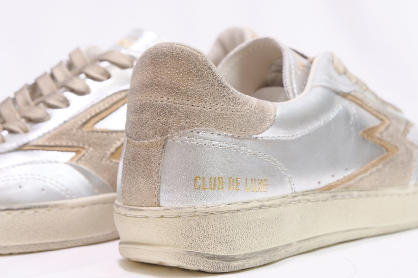 Sneakers argento laminato “Moa Concept”