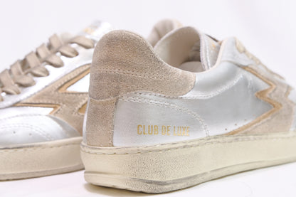 Sneakers argento laminato “Moa Concept”
